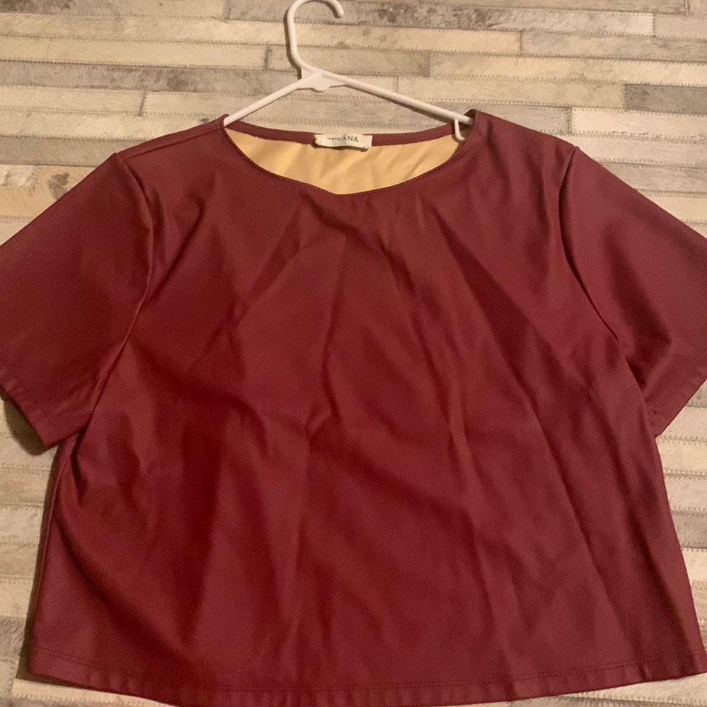 Mahogany/Maroon pleather crop top. Selling because I Don’t wear it anymore